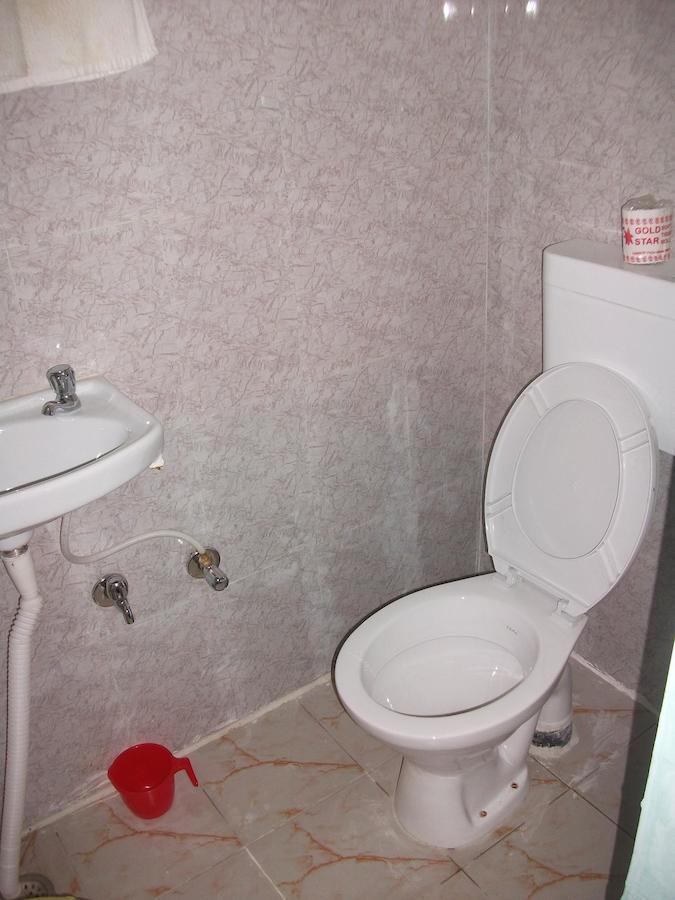 Holy City Inn Varanasi Quarto foto