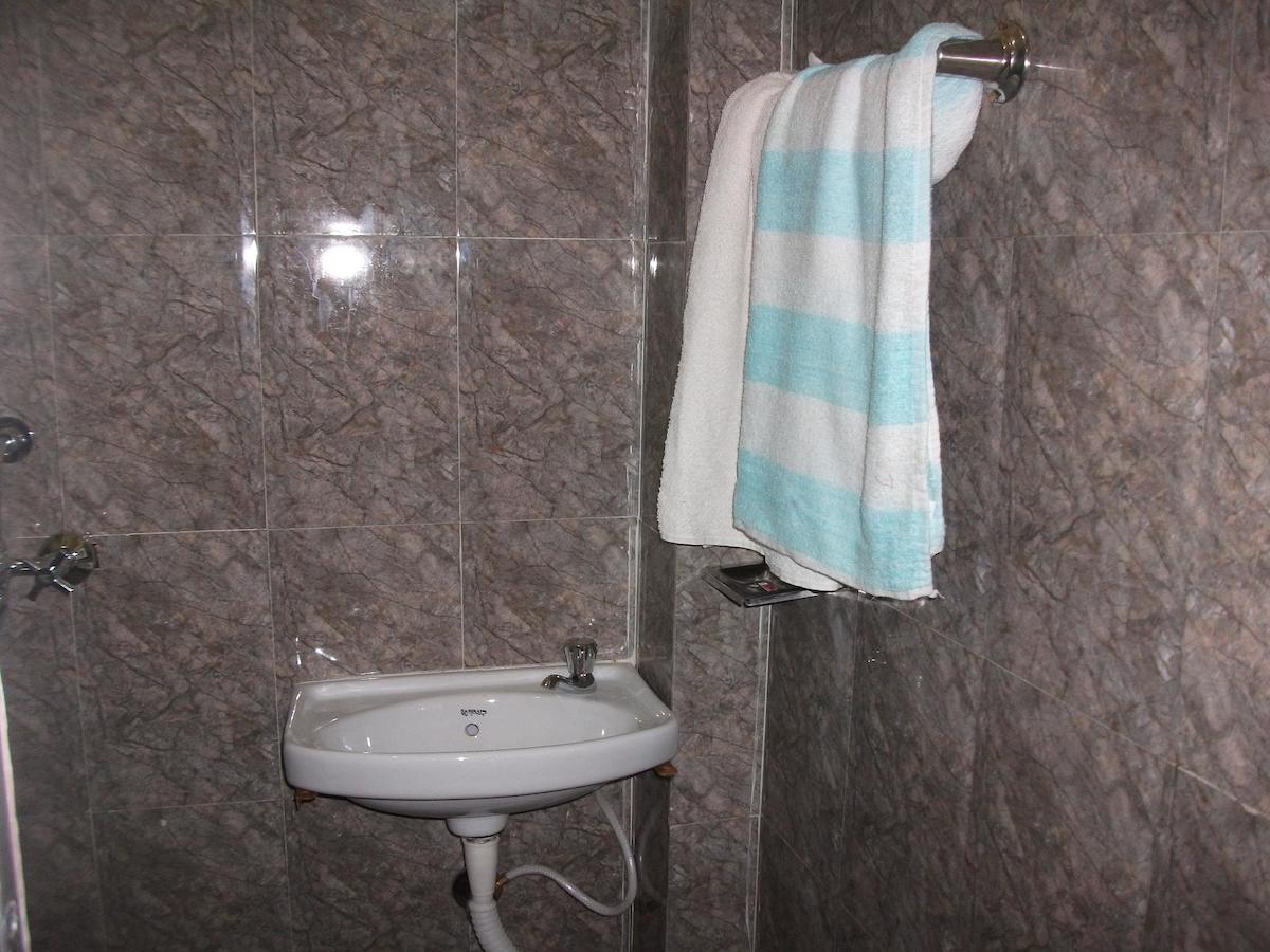 Holy City Inn Varanasi Quarto foto